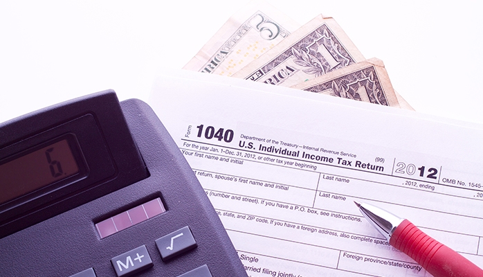 Taxe foncière 2026 : hausses, villes les plus taxées et effet sur le rendement